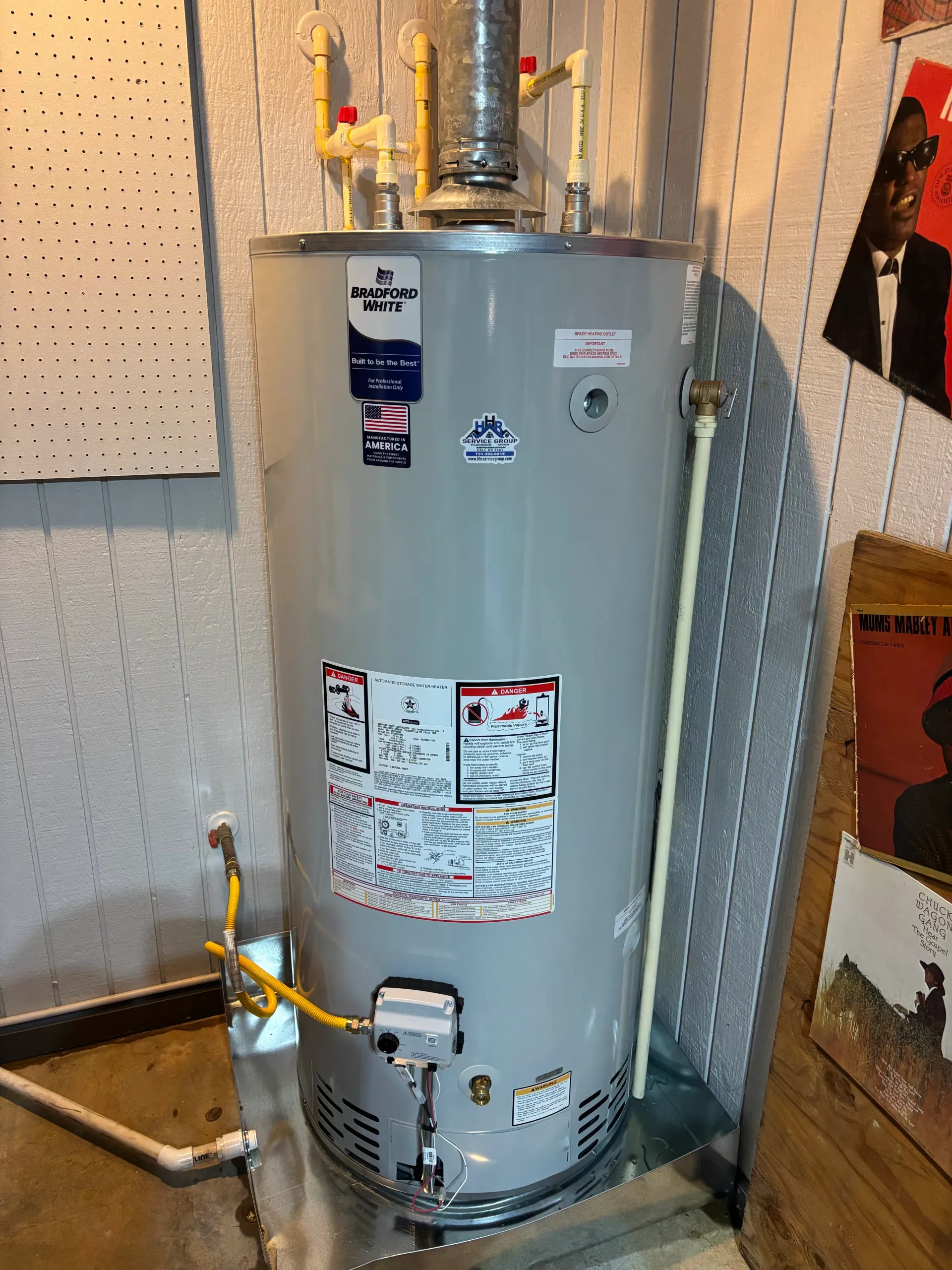Bradford White gas water heater installation with HHR Service Group sticker
